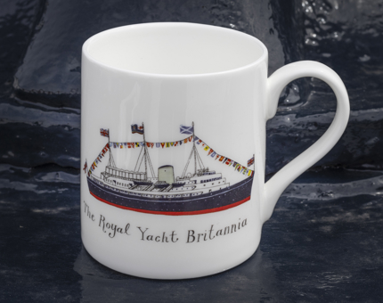 A white mug with an illustration of The Royal Yacht Britannia on it. 