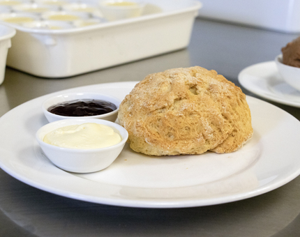 Scone with jam and cream