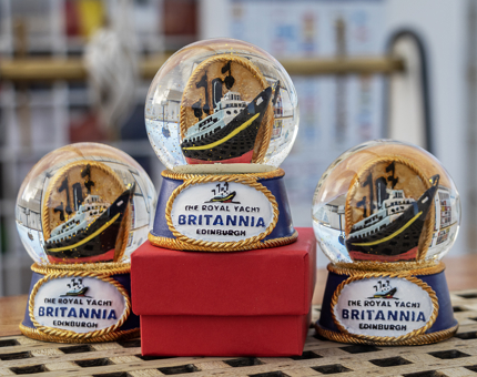 A trio of Royal Yacht snowglobes. 