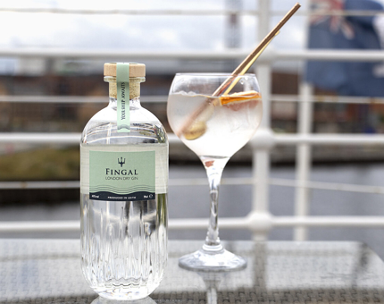 A bottle of Fingal gin and glass. 