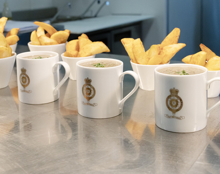 Cups in a row with chips in them 