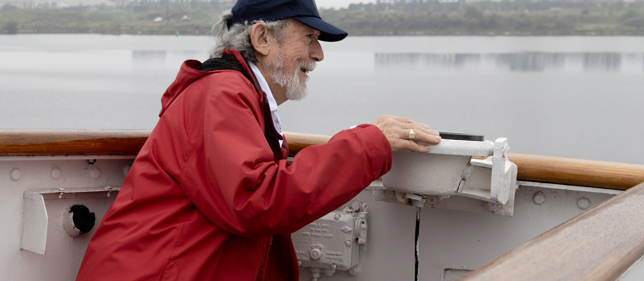 A Yottie standing on the Pilot Bridge, taking coordinates.
