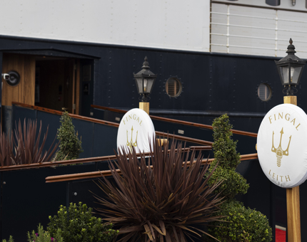 A ramp walkway onto a ship. 