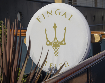 A perry buoy with a white cover on it, stationed outside Fingal hotels entrance. 