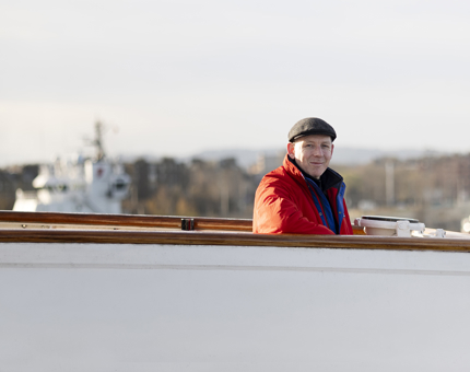 A visitor enjoying the sunshine and views from Britannia's decks. 