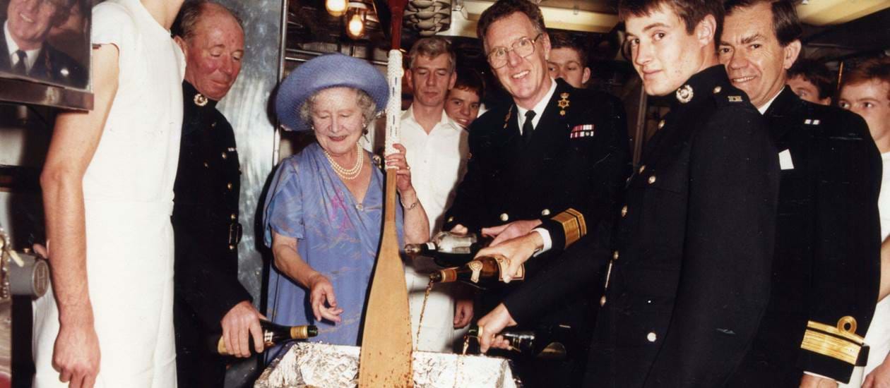Queen Mother stirring the Christmas pudding 