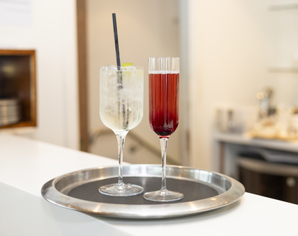 Two drinks on a tray in the Royal Deck Tearoom, The Royal Yacht Britannia. 