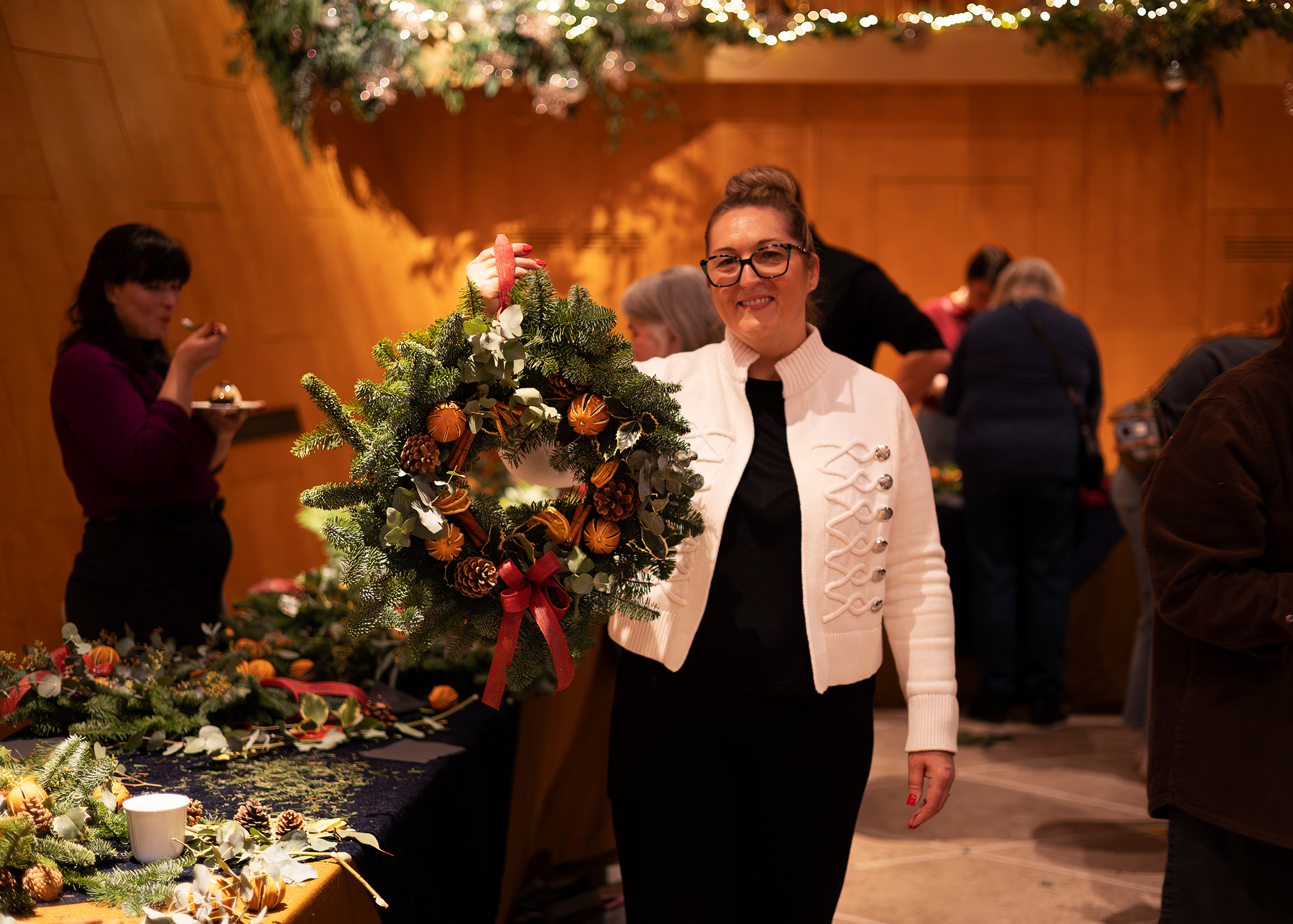 Woman holding a Christmas wreath