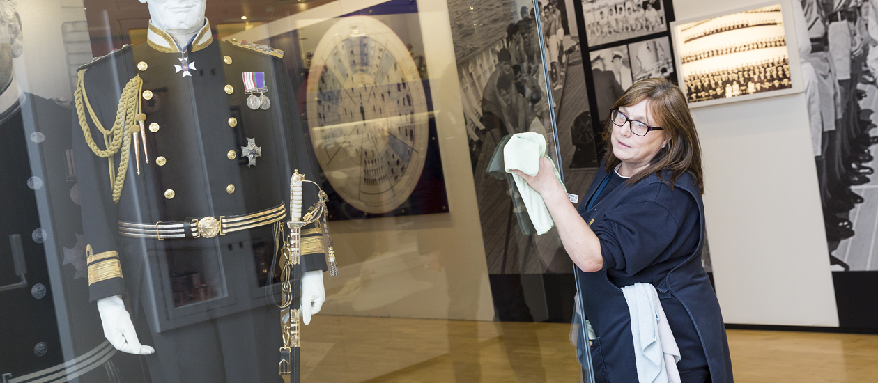 Eileen cleaning in the Visitor Centre,