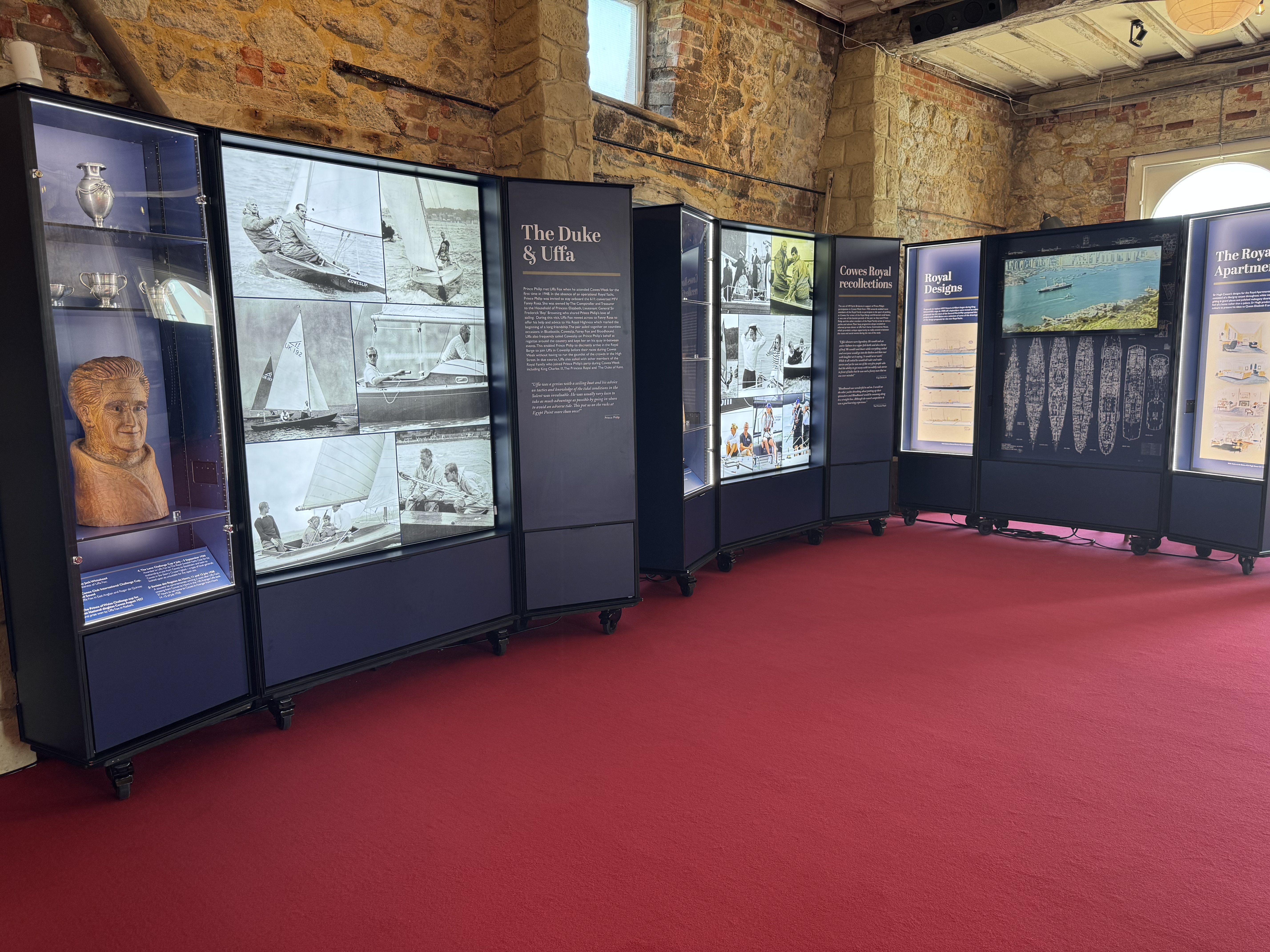 Panels on a wall with graphics and text for visitors to read.