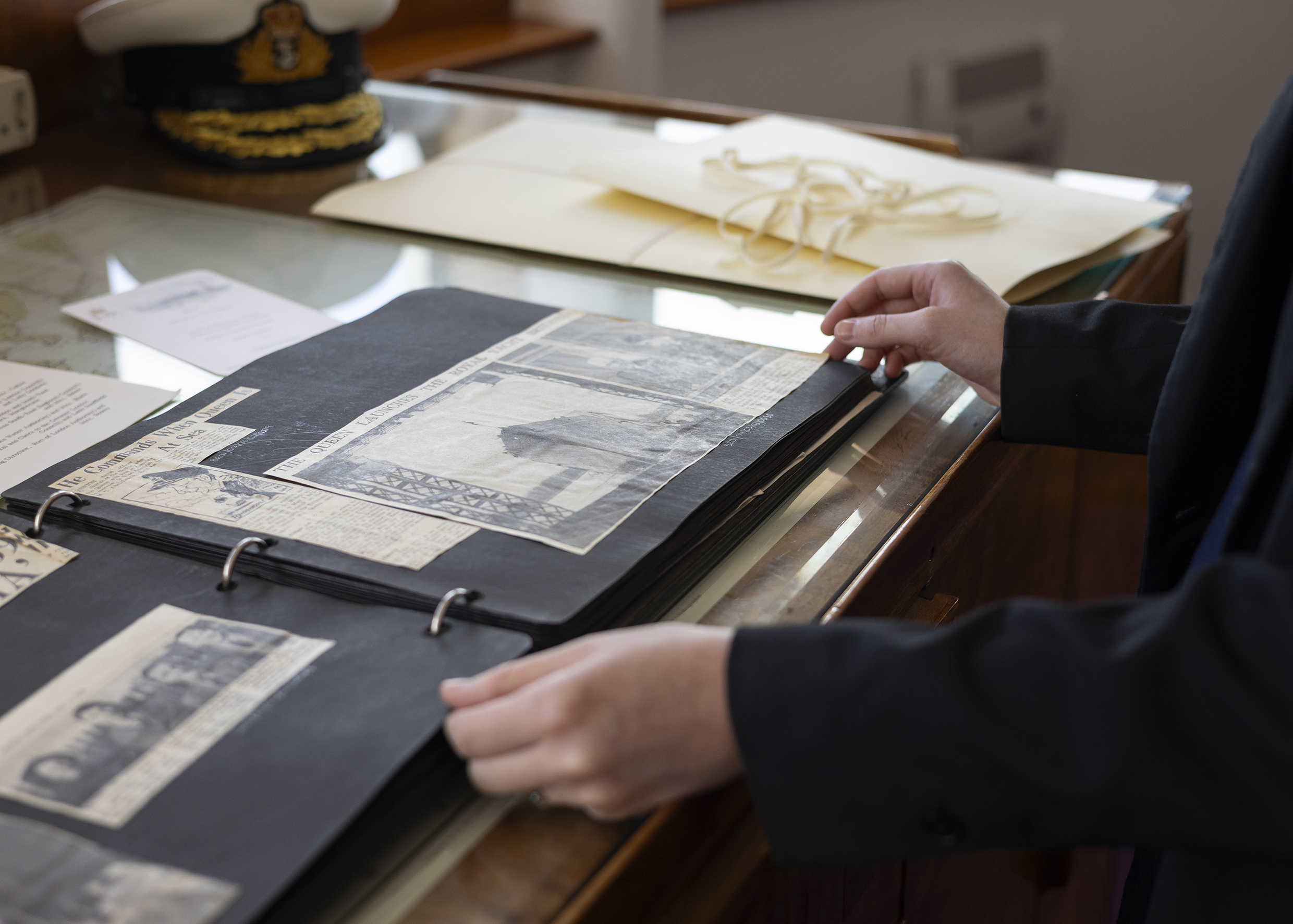 A scrapbook from Britannia's archive containing newspaper clippings. 