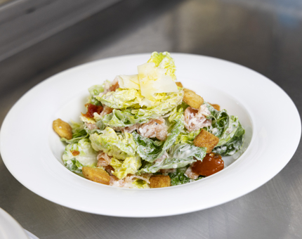 A Caesar Salad ready to be served in the Royal Deck Tearoom