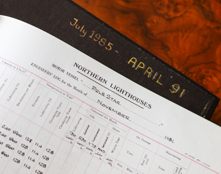 A close up of a log book for the Northern Lighthouses. 
