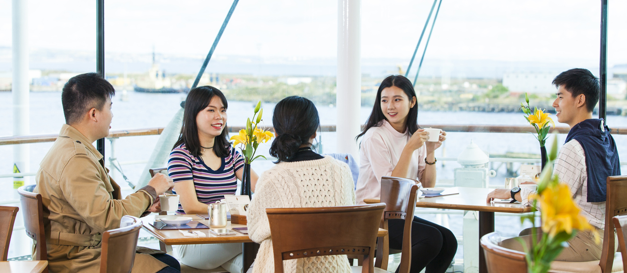 group of people eating in the tearoom