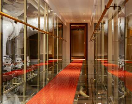 The Engine Room walkway on Fingal Hotel. The floor is red. 