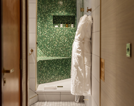 A glance through a cabin into a bathroom aboard Fingal