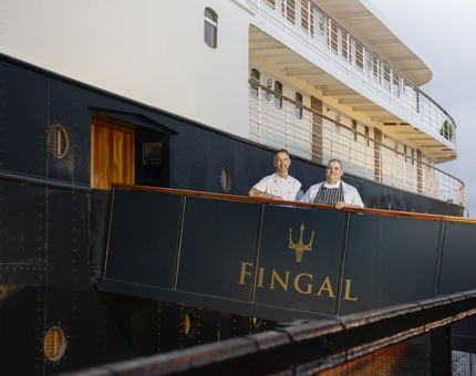 Two chefs standing on Fingal's gangway in Leith. 