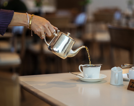 Pouring tea in the Tearoom