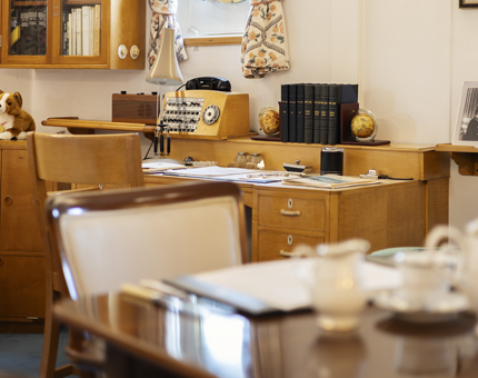 The Admiral's Day cabin aboard Britannia, there is a desk in the background. 