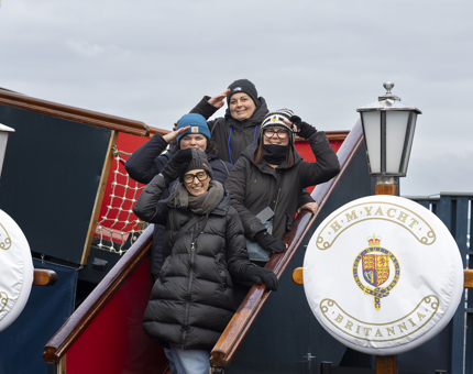 A group of friends pose for a photo on the Royal Brow