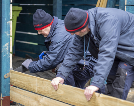 Facilities Officers Mark & Billy making a new storage area.