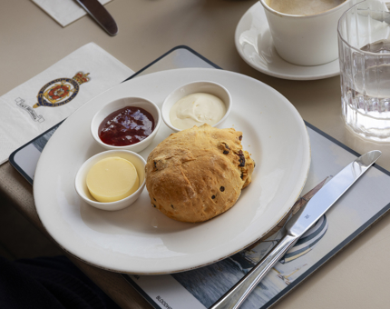 A scone with cream and jam in the Royal Deck Tearoom. 