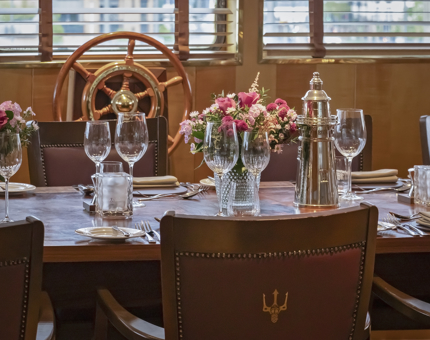 The Bridge aboard Fingal has a table set for a meal. 