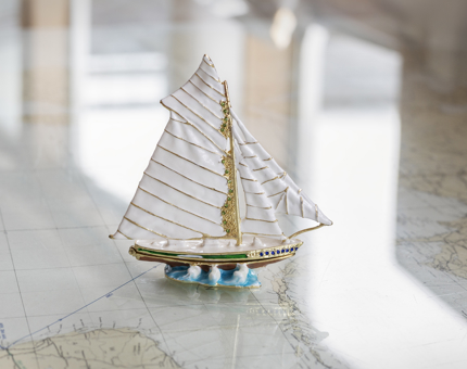 A small sailing yacht trinket. 
