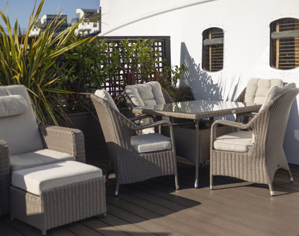 The private deck of Skerryvore Suite with a table and chairs. 