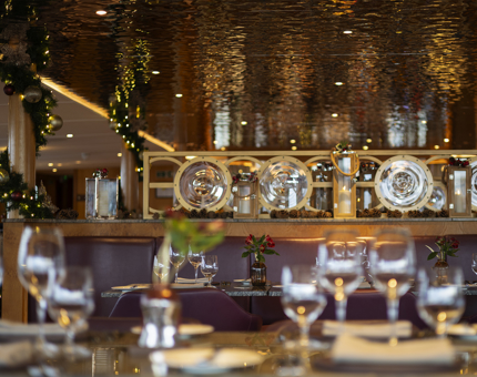 The tables are set and decorated for Christmas in The Lighthouse Restaurant. 