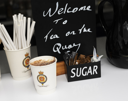 Tea on the Quay, a coffee is on the counter. 